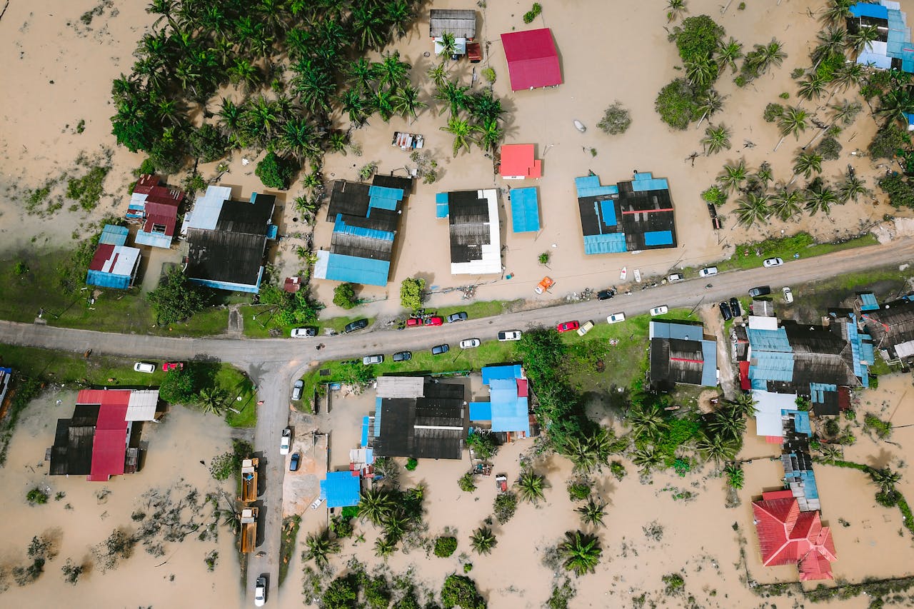 Aerial shot showing flooded houses in Kijal, Terengganu, Malaysia, highlighting the impact of natural disasters.